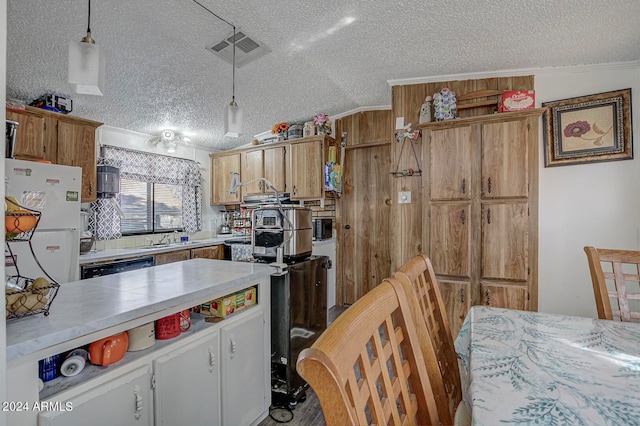 kitchen featuring crown molding, pendant lighting, white fridge, and a textured ceiling