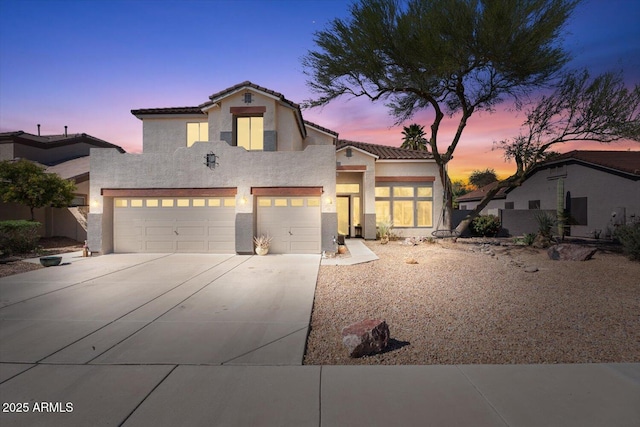 838 E Nolan Pl, Chandler, AZ 85249 - mediterranean / spanish-style home with a garage, stucco siding, driveway, and a tile roof