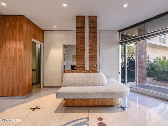 2201 N Central Ave Unit 4E, Phoenix, AZ 85004 - bedroom featuring wood walls and recessed lighting