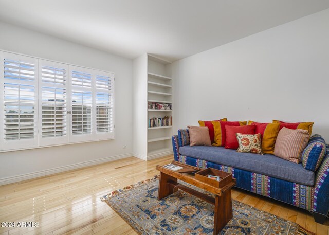 2201 N Central Ave Unit 4E, Phoenix, AZ 85004 - living area with wood finished floors and baseboards