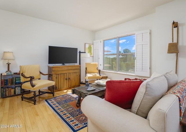 2201 N Central Ave Unit 4E, Phoenix, AZ 85004 - living area with hardwood / wood-style floors