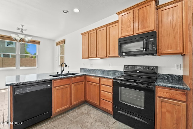 2337 E Fraktur Rd, Phoenix, AZ 85040 - kitchen featuring a sink, a chandelier, a peninsula, light tile patterned floors, and black appliances