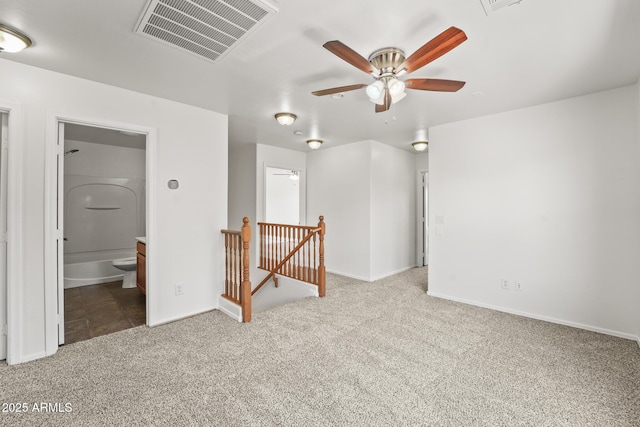 2337 E Fraktur Rd, Phoenix, AZ 85040 - carpeted empty room featuring baseboards, a ceiling fan, and visible vents