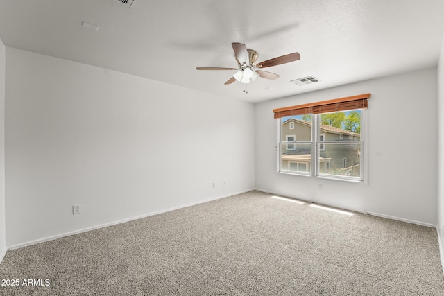 2337 E Fraktur Rd, Phoenix, AZ 85040 - carpeted empty room with visible vents, baseboards, and ceiling fan