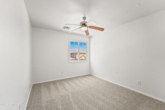 2337 E Fraktur Rd, Phoenix, AZ 85040 - carpeted spare room featuring baseboards, a ceiling fan, and visible vents