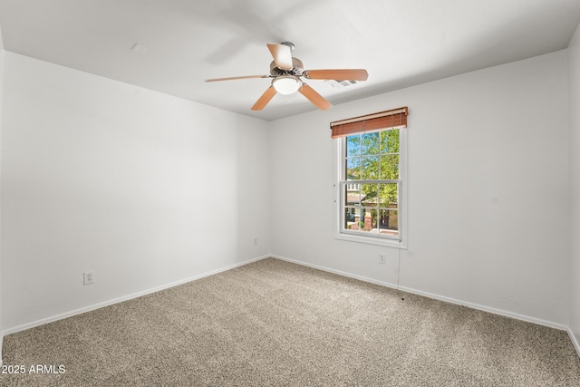 2337 E Fraktur Rd, Phoenix, AZ 85040 - unfurnished room featuring a ceiling fan, baseboards, and carpet