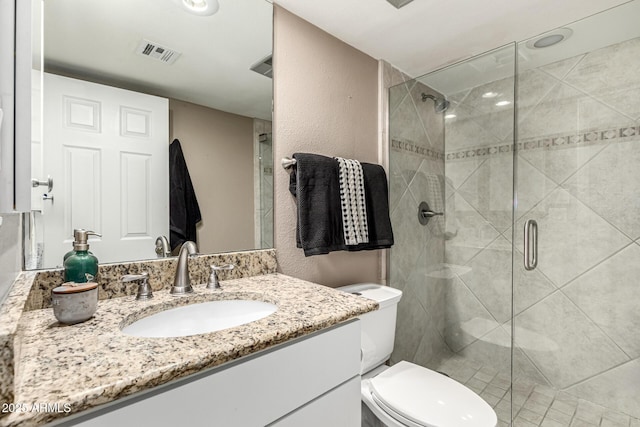 7436 E Chaparral Rd Unit 124B, Scottsdale, AZ 85250 - full bath with a stall shower, toilet, vanity, and a textured wall