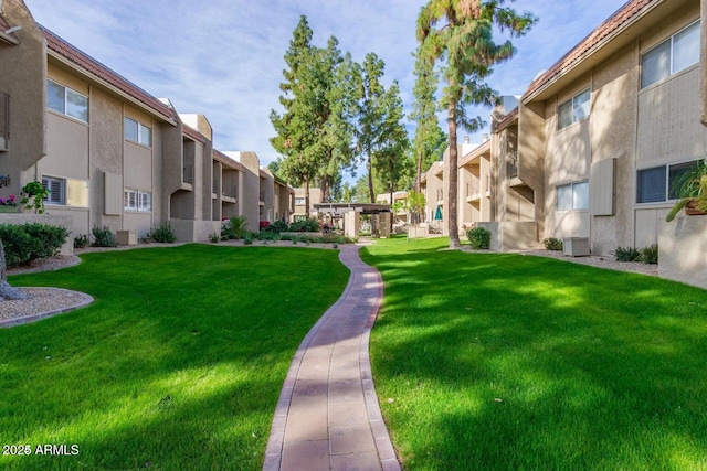 7436 E Chaparral Rd Unit 124B, Scottsdale, AZ 85250 - view of home's community with a residential view and a yard