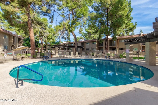 7436 E Chaparral Rd Unit 124B, Scottsdale, AZ 85250 - view of swimming pool with fence and a patio area