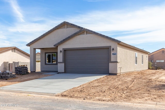 view of front of property with a garage