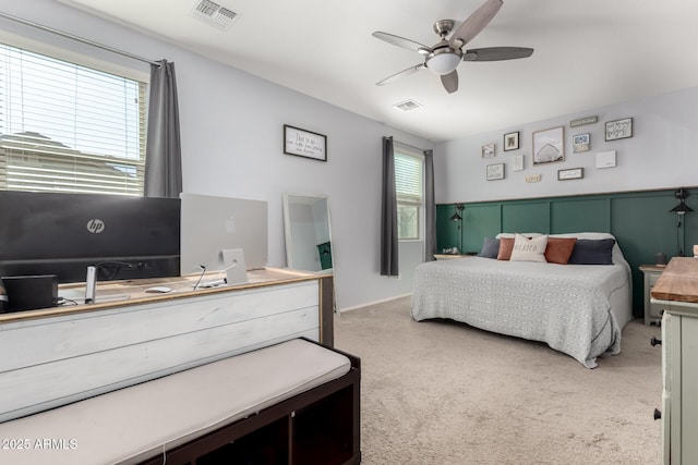 bedroom featuring ceiling fan, visible vents, and carpet flooring