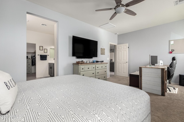 carpeted bedroom featuring ceiling fan and visible vents