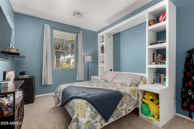 bedroom with baseboards, visible vents, and carpet flooring