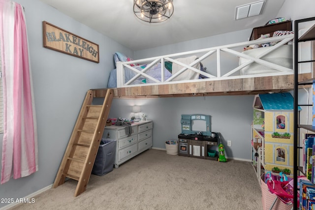 carpeted bedroom featuring visible vents and baseboards