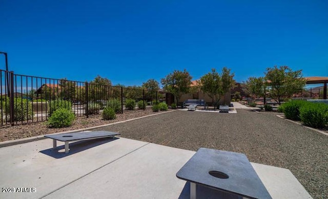 exterior space featuring a patio area and fence