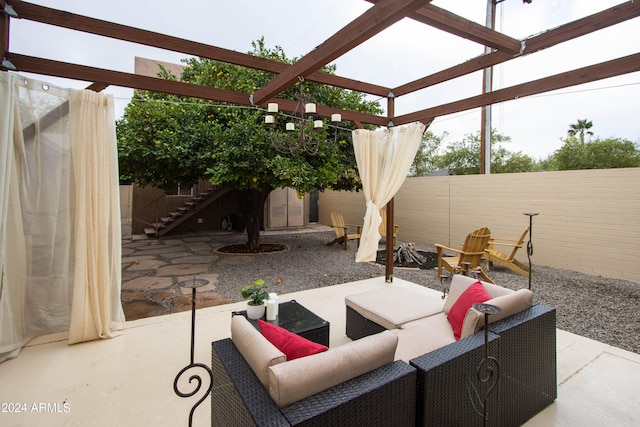 view of patio / terrace with a pergola and an outdoor living space