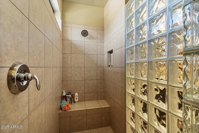 full bathroom featuring a tile shower