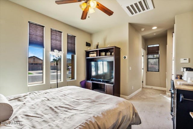 bedroom with baseboards, visible vents, a ceiling fan, light colored carpet, and recessed lighting