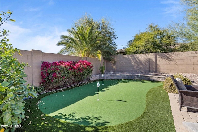 view of yard featuring a fenced backyard
