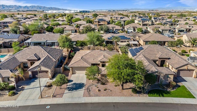 bird's eye view featuring a residential view and a mountain view