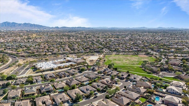 drone / aerial view with a residential view and a mountain view