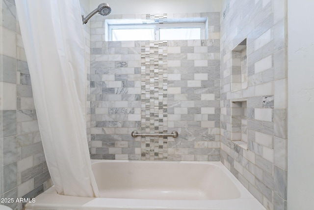 bathroom with shower / bath combo