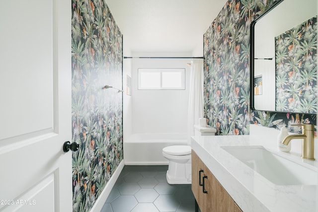 full bathroom with tile patterned flooring, vanity, shower / washtub combination, and toilet