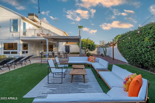 view of patio / terrace featuring an outdoor living space and a balcony