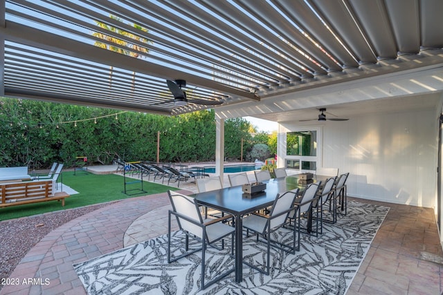 view of patio / terrace featuring a fenced in pool, a pergola, and ceiling fan