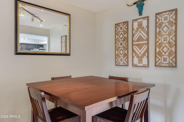 dining room with track lighting