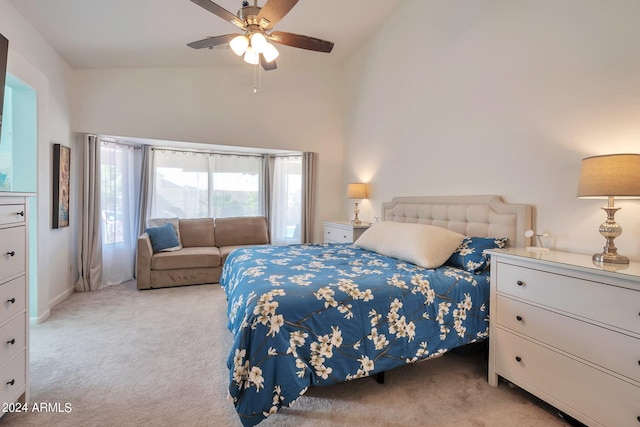 bedroom featuring high vaulted ceiling, ceiling fan, and light colored carpet