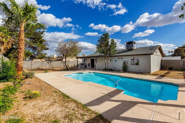 view of pool with a patio, a fenced backyard, a fenced in pool, and central air condition unit