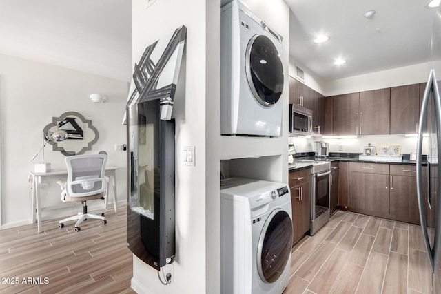 3635 N 68th St Unit 5, Scottsdale, AZ 85251 - laundry room featuring wood finish floors, stacked washer / drying machine, recessed lighting, and baseboards