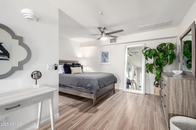 3635 N 68th St Unit 5, Scottsdale, AZ 85251 - bedroom with light wood-type flooring, baseboards, and ceiling fan