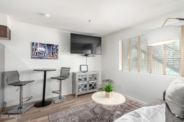 3635 N 68th St Unit 5, Scottsdale, AZ 85251 - living room featuring wood finished floors and baseboards