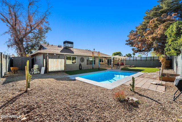 view of pool featuring central AC unit and a patio area