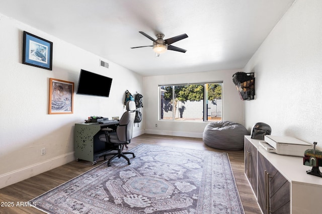 office space with ceiling fan and light hardwood / wood-style floors