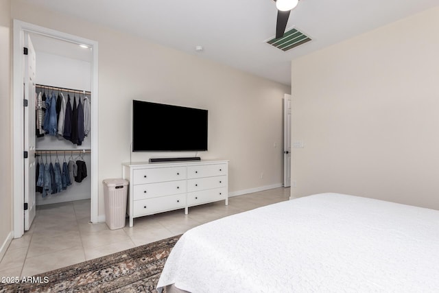 17918 W Toronto Way, Goodyear, AZ 85338 - bedroom with a spacious closet, light tile patterned floors, and a closet