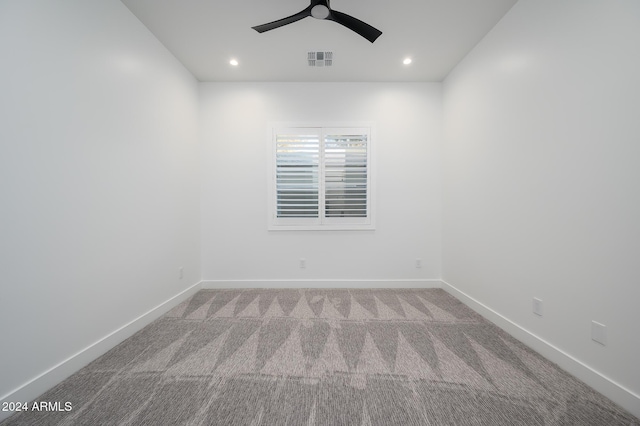 carpeted empty room with ceiling fan