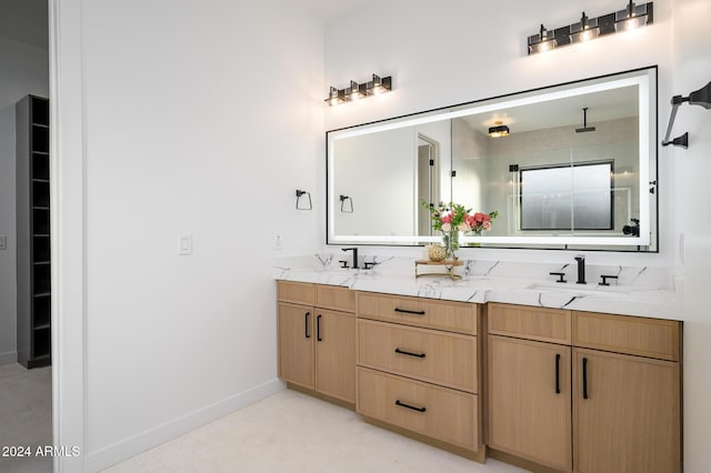 bathroom with vanity and walk in shower