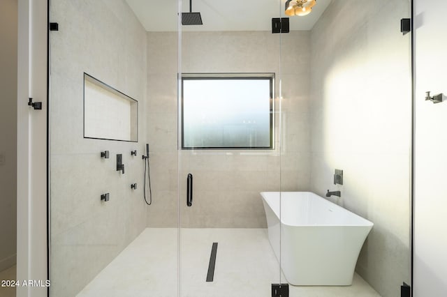 bathroom with independent shower and bath