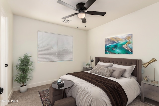 bedroom featuring light colored carpet and ceiling fan