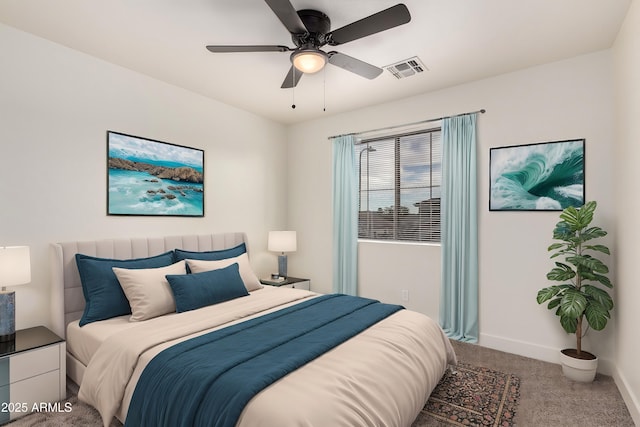 carpeted bedroom with ceiling fan