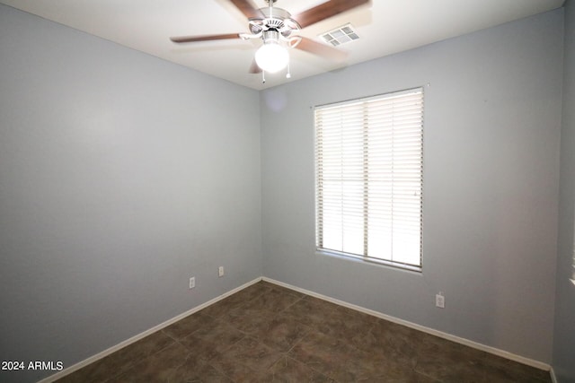 unfurnished room with ceiling fan