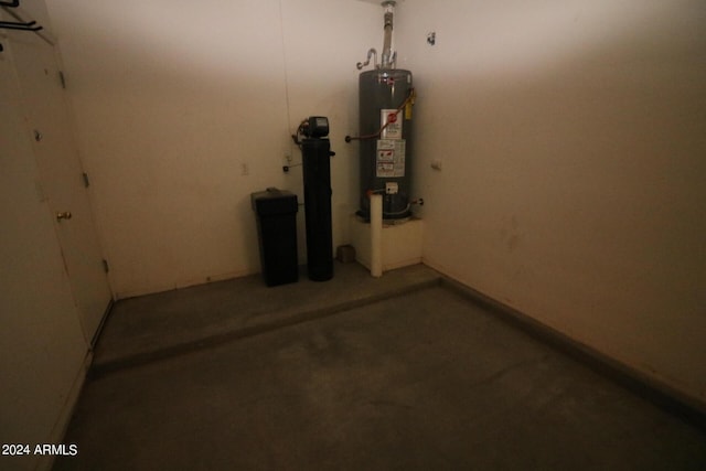 utility room with gas water heater