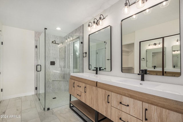 bathroom with vanity and walk in shower