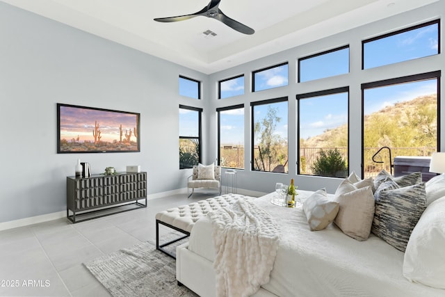 tiled bedroom with ceiling fan