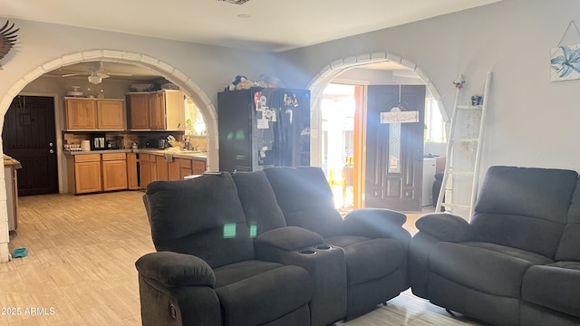 living room with light hardwood / wood-style floors