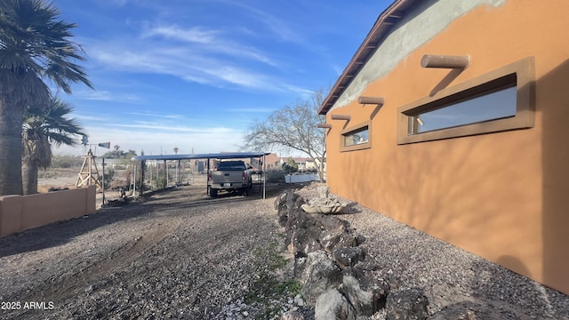 view of yard featuring a carport