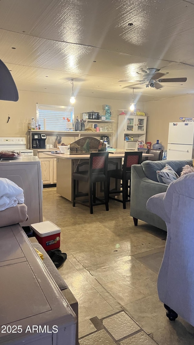 living room with washer / clothes dryer